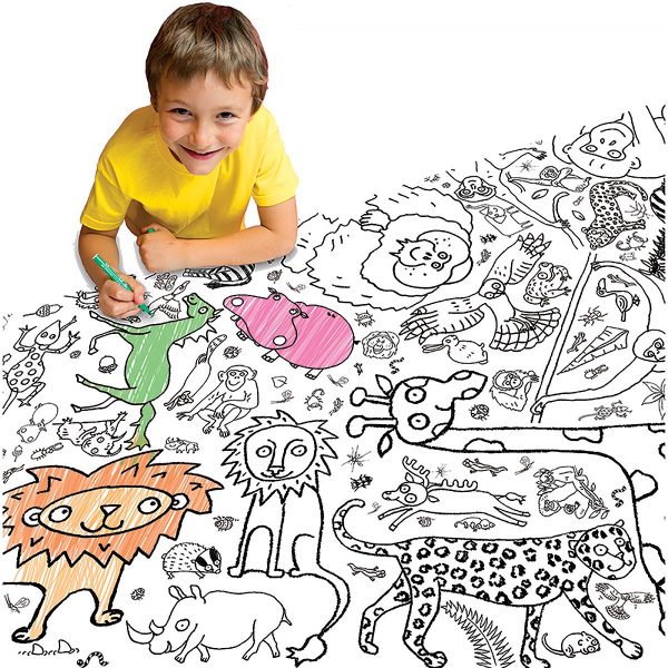 cheeky boy colouring in tablecloth