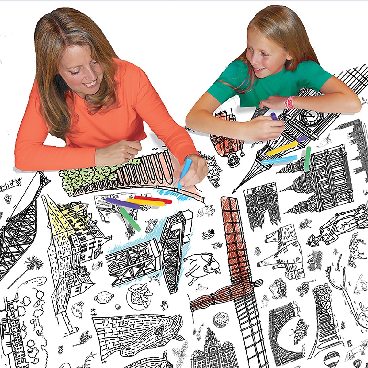 mother and daughter colouring in tablecloth