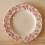 plate leaning against wall