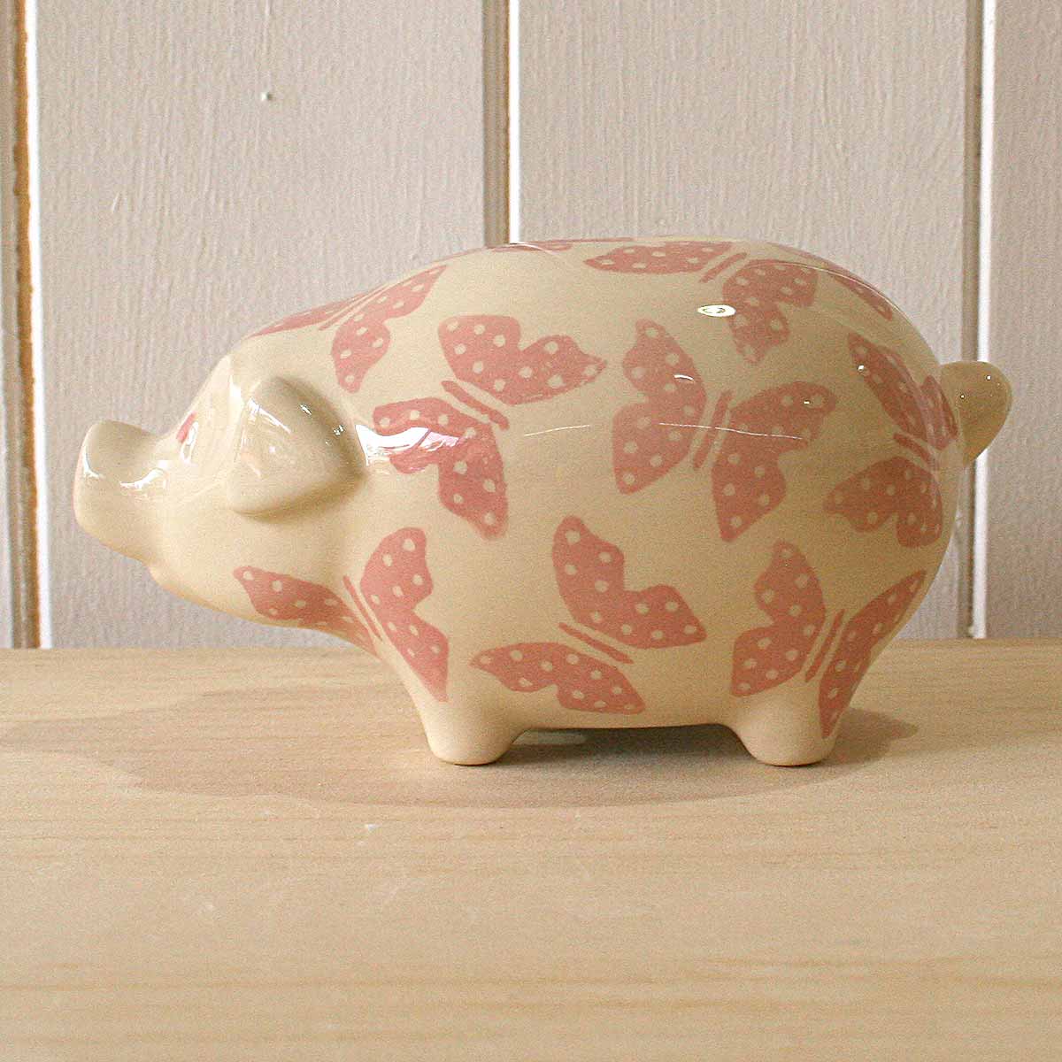 china pig on wood surface