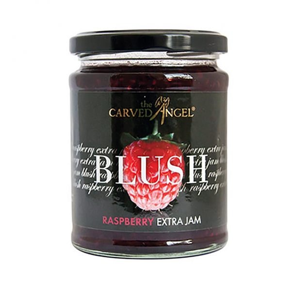 glass jar full of jam on white background