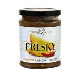 full glass jar of chutney on white background