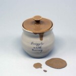 pot and splats on white background