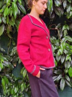 side view woman wearing jacket in garden