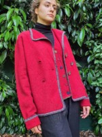 woman wearing jacket and matching waistcoat in garden