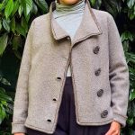 woman wearing jacket in garden