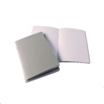three notebooks, one open, on a white background