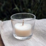 tea light cup on cloth on table