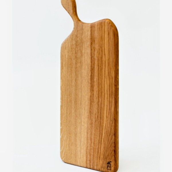 handled oak serving board on white background