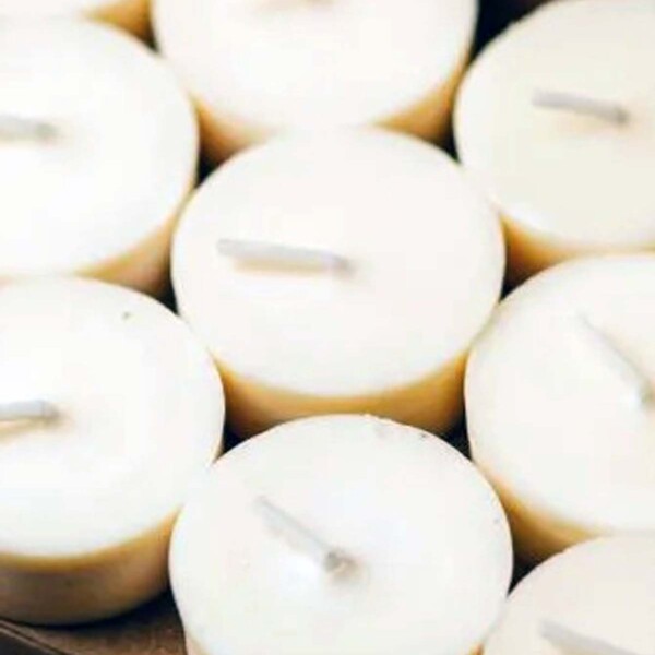 a group of naked tea lights