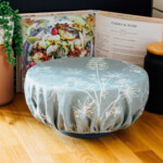 large covered bowl on work surface