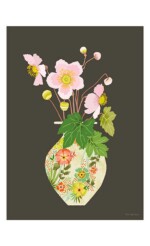 japanese anemone flowers and leaves in floral vase on indigo background